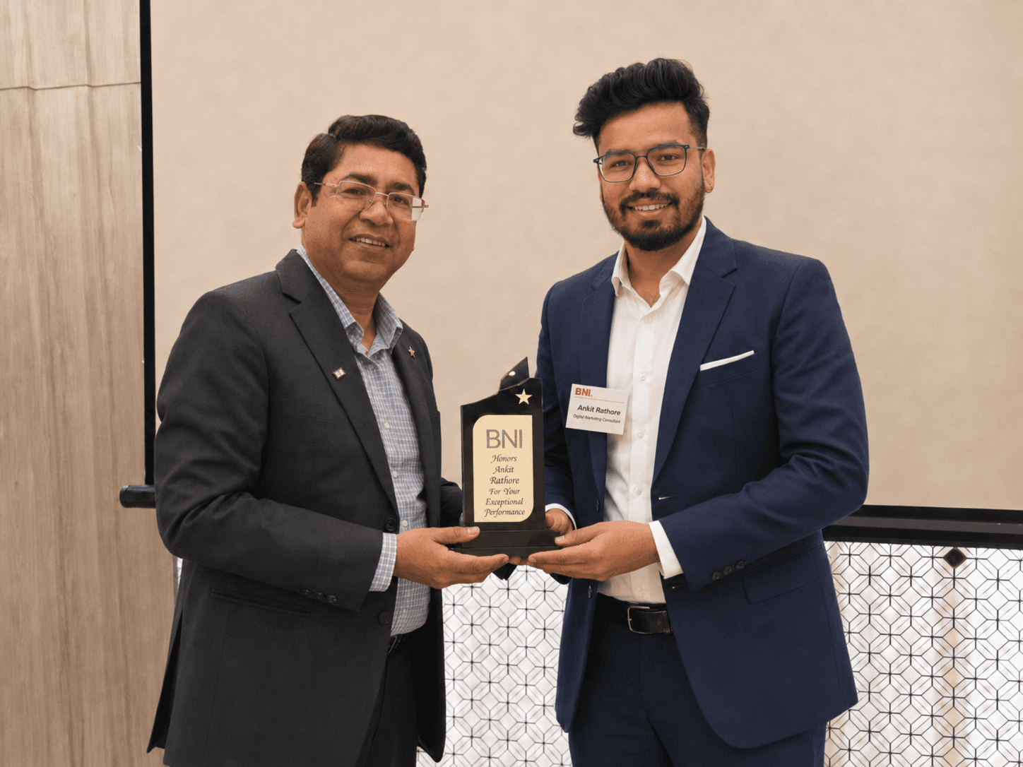 Ankit Rathore receiving BNI recognition award